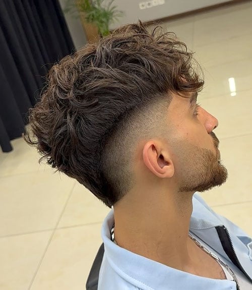 Wavy Mohawk with High Burst Fade