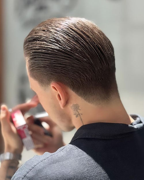 Stylish Slick Back with Low Taper Fade